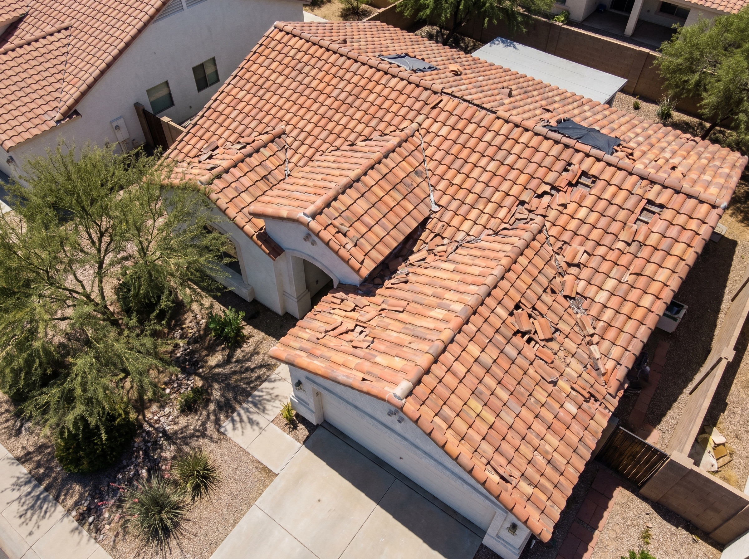 Glendale tile roof with cracked and lifted tiles before repair